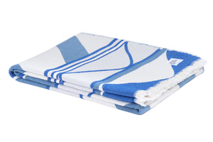 A folded white and blue Indigenous blanket displayed on a clean white background.